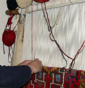 Weaving-Roghayeh Almasi-WikiRug.jpg